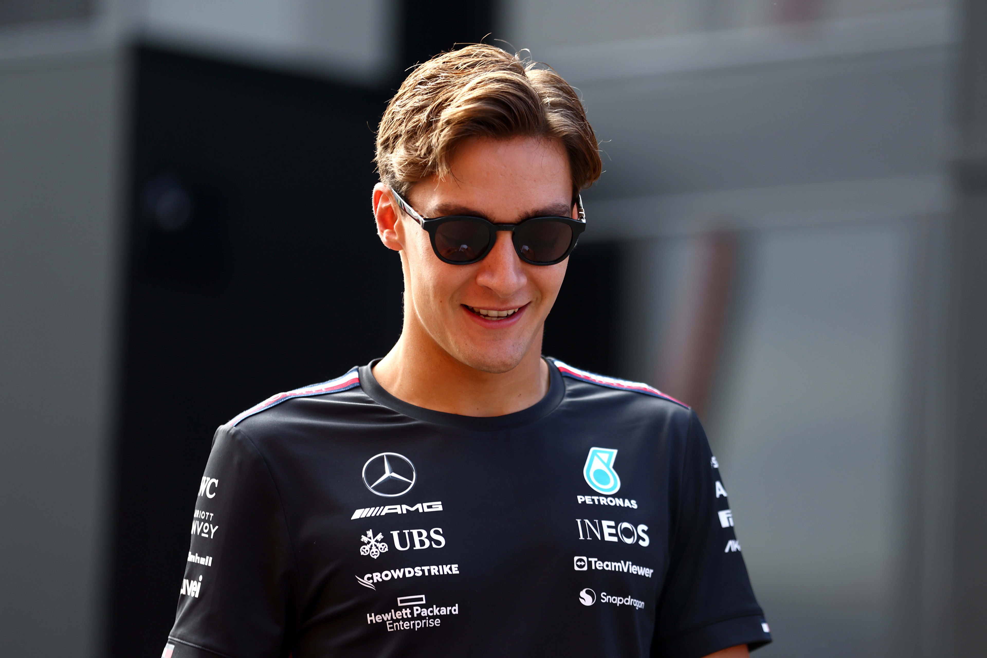 MONZA, ITALY - SEPTEMBER 03: George Russell of Great Britain and Mercedes looks on from the drivers