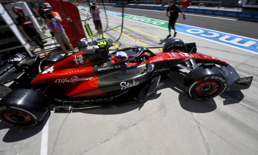 Alfa Romeo's Chinese driver Zhou Guanyu leaves the pits during the third practice session at the