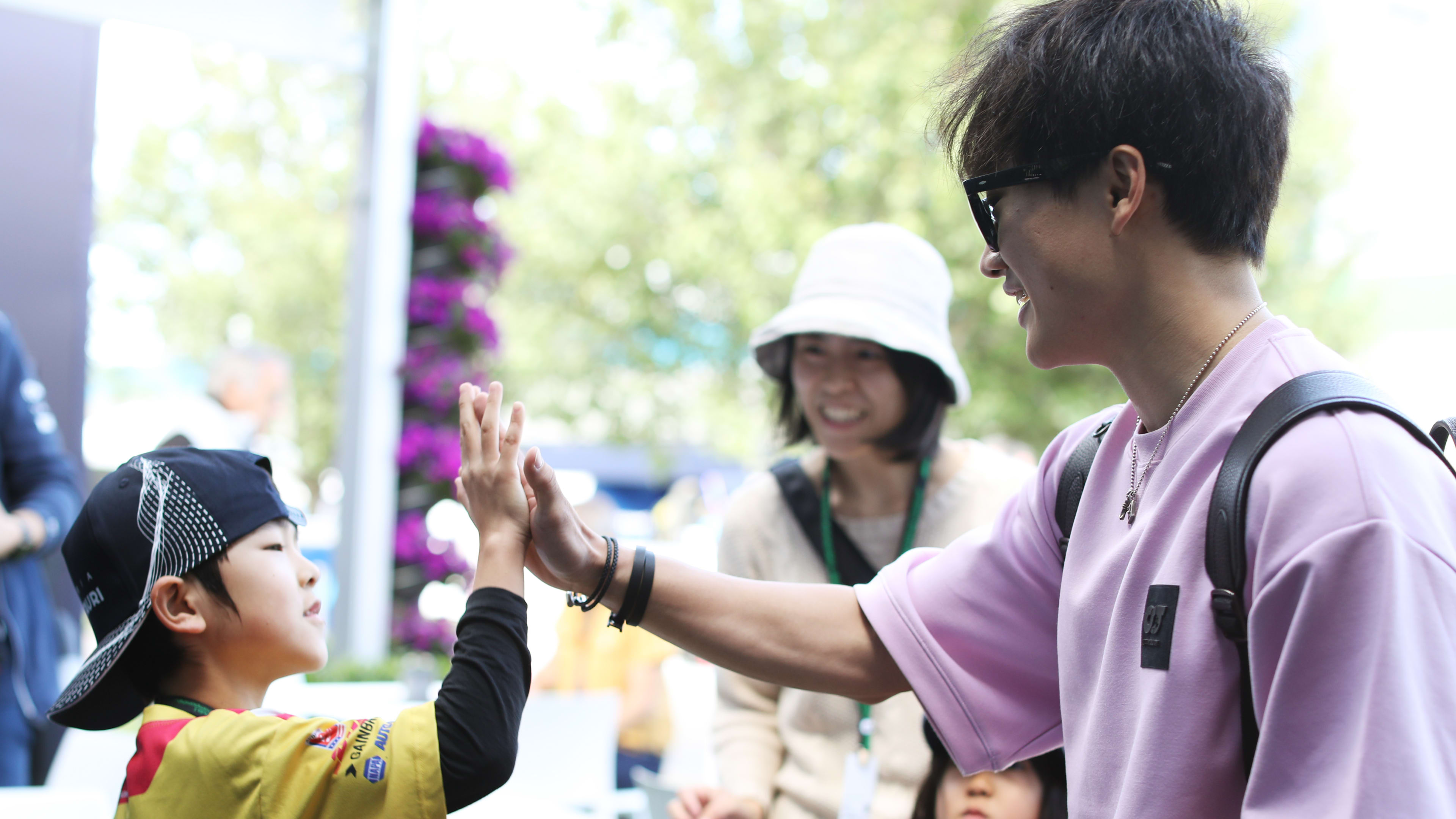 SUZUKA, JAPAN - OCTOBER 08: Yuki Tsunoda of Scuderia AlphaTauri and Japan during the fan forum